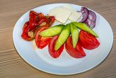 Arranged salad with fresh cheese
(tomatoes, cucumbers, roasted peppers, fresh 
cheese, onion) 450 gr.